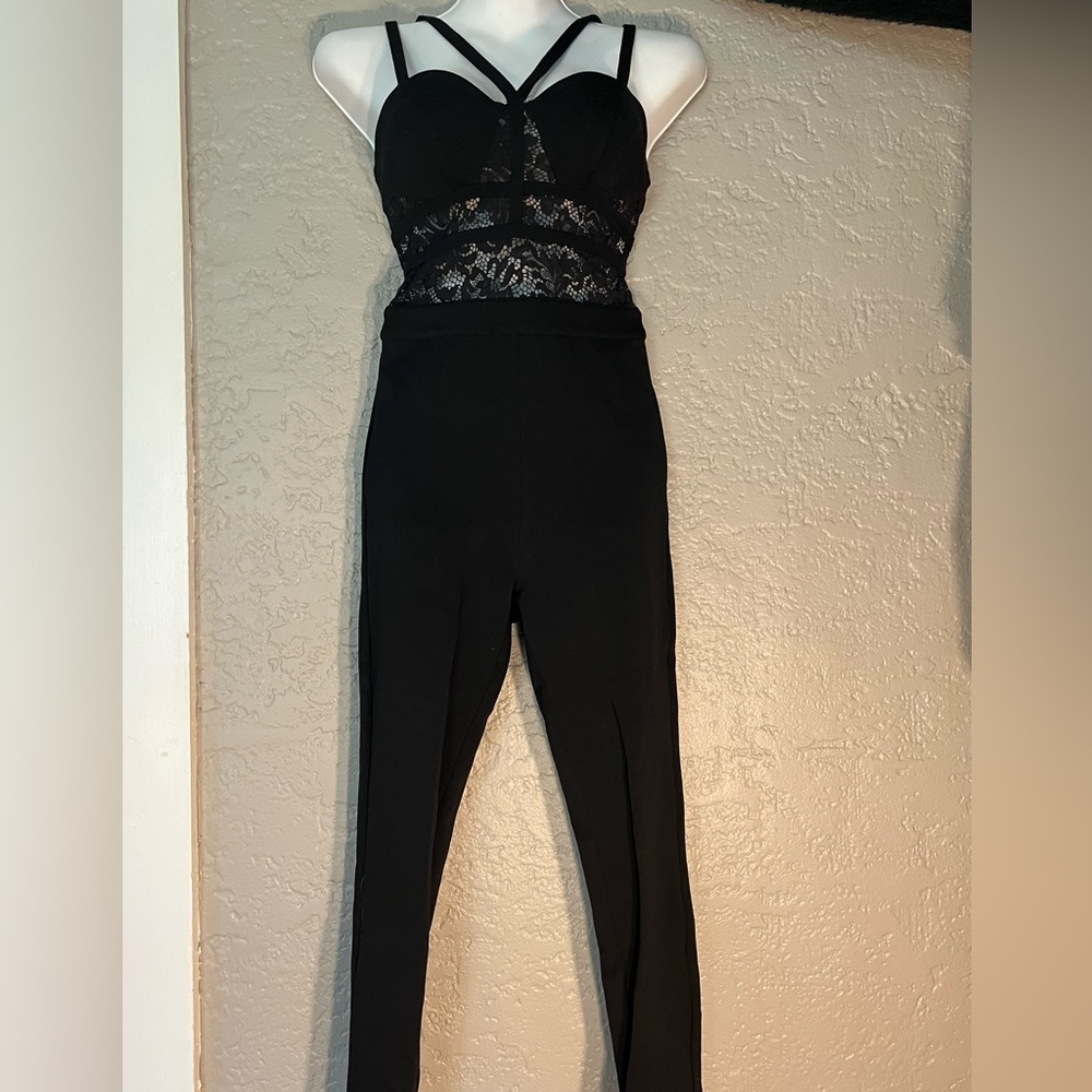 Bebe fitted black jumpsuit with lace detail, size XS